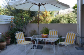 Kalamata beach maizonette ground floor and semi-basement with yard